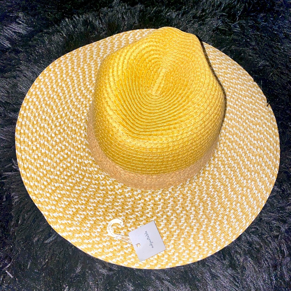 A new day adjustable beach sun hat - trendy for the beach.